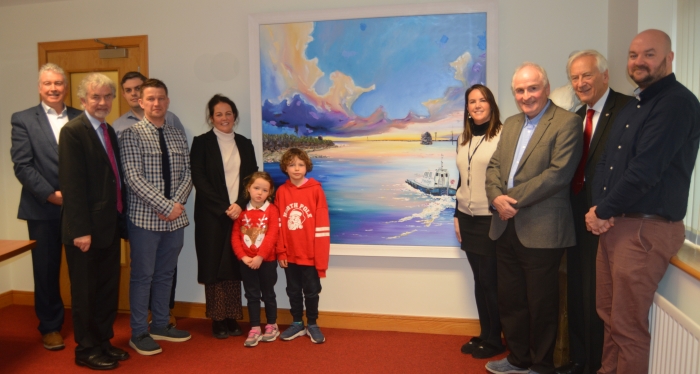 2 groups of people standing beside painting of pilot boat